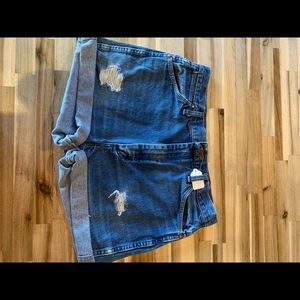 medium wash, wrangler shorts